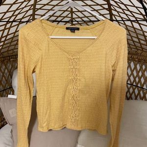 Yellow American eagle long sleeve shirt with tie detailing on front